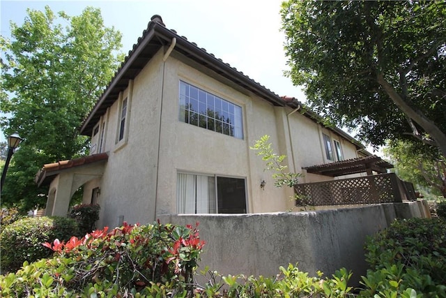 23362 La Mar Unit A, Mission Viejo, CA 92691 - rear view of property with stucco siding