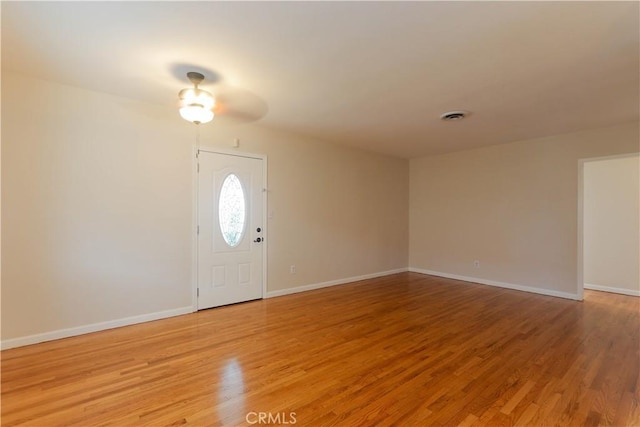 10624 Shellyfield Rd, Downey, CA 90241 - foyer entrance featuring light wood finished floors, baseboards, and a ceiling fan