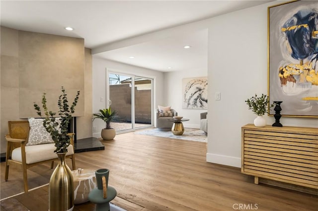 9802 Effingham Dr, Huntington Beach, CA 92646 - living area with wood finished floors, baseboards, and recessed lighting