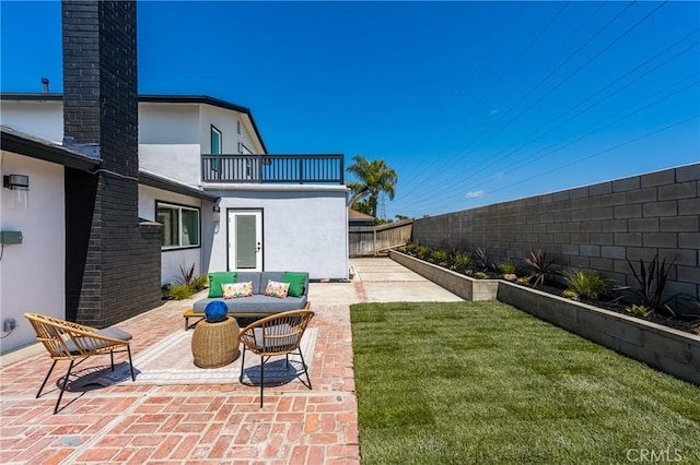 9802 Effingham Dr, Huntington Beach, CA 92646 - view of patio / terrace with a balcony and an outdoor hangout area