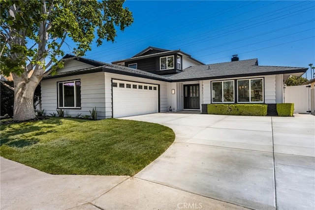 9802 Effingham Dr, Huntington Beach, CA 92646 - view of front of property with a garage and concrete driveway