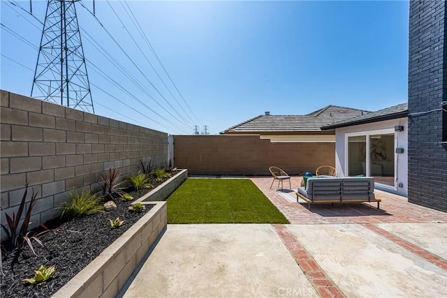 9802 Effingham Dr, Huntington Beach, CA 92646 - fenced backyard featuring a patio area and outdoor lounge area
