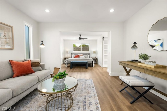 9802 Effingham Dr, Huntington Beach, CA 92646 - living room with wood finished floors, recessed lighting, baseboards, and a ceiling fan