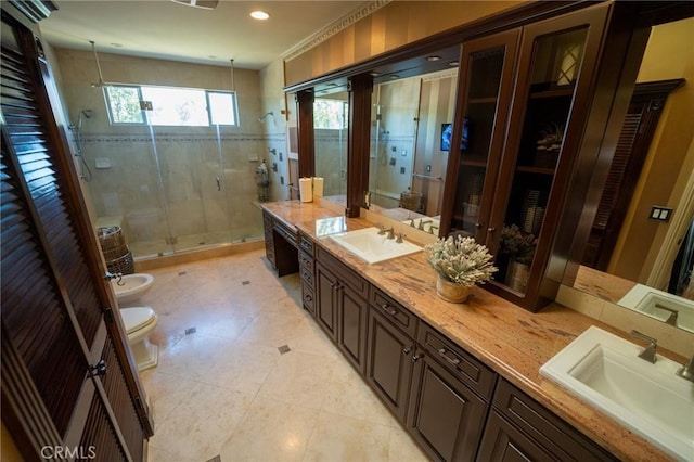 19162 Liggett St, Northridge, CA 91324 - bathroom with double vanity, a shower stall, toilet, a bidet, and recessed lighting