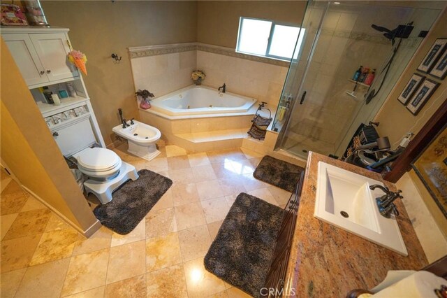 19162 Liggett St, Northridge, CA 91324 - full bathroom featuring a stall shower, a jetted tub, a bidet, toilet, and vanity