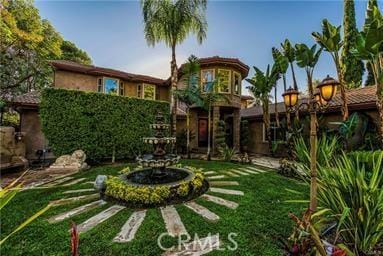 19162 Liggett St, Northridge, CA 91324 - back of house with a yard