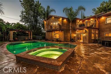 19162 Liggett St, Northridge, CA 91324 - view of pool featuring a pergola, a patio area, and a pool with connected hot tub