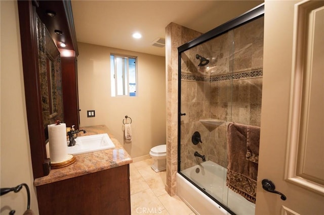 19162 Liggett St, Northridge, CA 91324 - full bath featuring toilet, vanity, shower / bath combination with glass door, tile patterned flooring, and baseboards