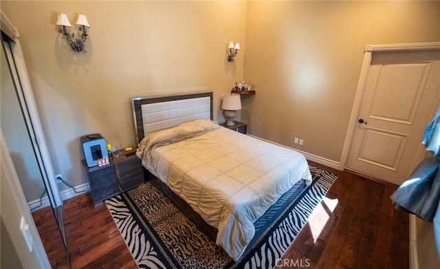 19162 Liggett St, Northridge, CA 91324 - bedroom with hardwood / wood-style flooring and baseboards