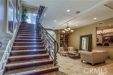 19162 Liggett St, Northridge, CA 91324 - staircase with a chandelier and recessed lighting