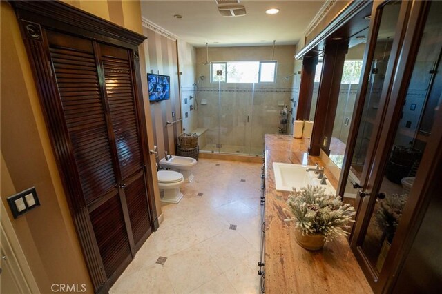 19162 Liggett St, Northridge, CA 91324 - bathroom with toilet, a bidet, vanity, a shower stall, and a closet