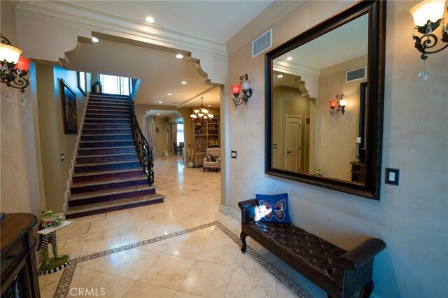 19162 Liggett St, Northridge, CA 91324 - entrance foyer featuring crown molding, stairway, a chandelier, recessed lighting, and baseboards