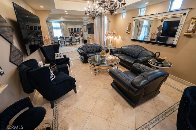 19162 Liggett St, Northridge, CA 91324 - tiled living area with a chandelier, recessed lighting, and baseboards