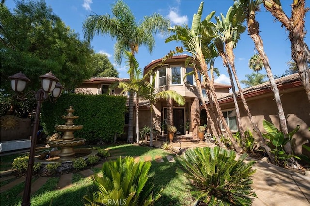 19162 Liggett St, Northridge, CA 91324 - view of front of house with stucco siding and a tiled roof