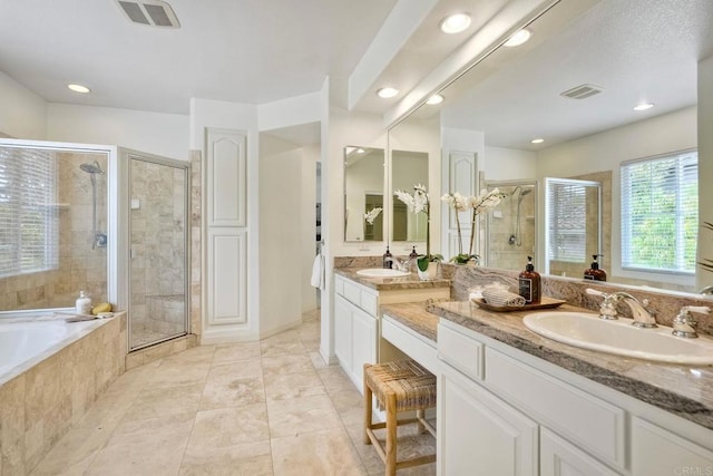 1026 Turnstone Rd, Carlsbad, CA 92011 - full bath with a shower stall, vanity, tile patterned floors, a garden tub, and recessed lighting