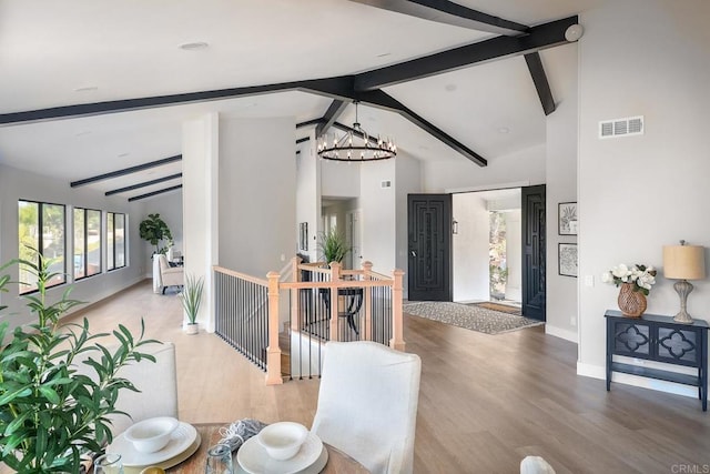 1051 Via Rancho Pkwy, Escondido, CA 92029 - living area with a chandelier, wood finished floors, and baseboards
