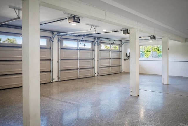 1051 Via Rancho Pkwy, Escondido, CA 92029 - garage featuring a garage door opener