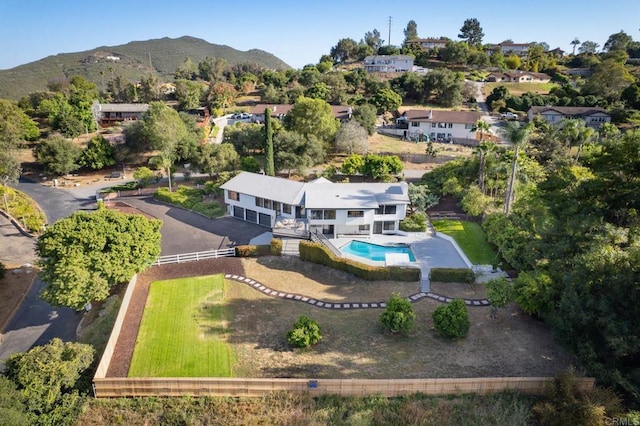 1051 Via Rancho Pkwy, Escondido, CA 92029 - aerial view of property and surrounding area featuring a pool and a mountainous background