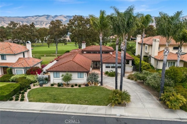 5933 Birkdale Ln, San Luis Obispo, CA 93401 - view of front of home featuring a tile roof, a mountain view, a front yard, a residential view, and stucco siding