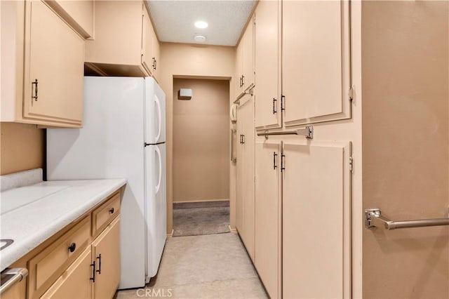 332 E 7th St, San Jacinto, CA 92583 - kitchen featuring freestanding refrigerator, light countertops, and recessed lighting