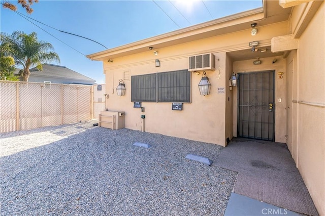 332 E 7th St, San Jacinto, CA 92583 - property entrance featuring stucco siding