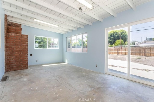 15903 Bryant St, North Hills, CA 91343 - empty room featuring concrete floors and beam ceiling