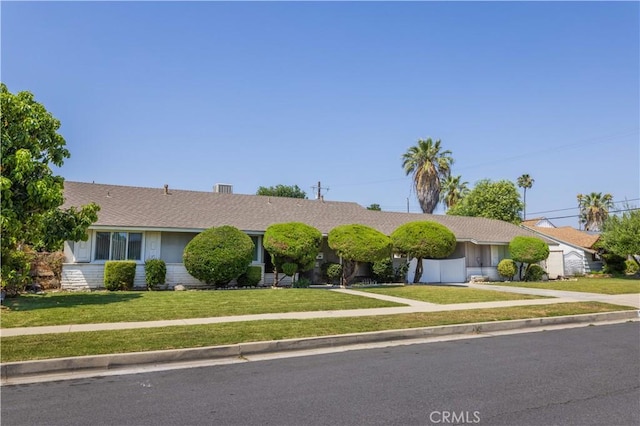 15903 Bryant St, North Hills, CA 91343 - ranch-style home featuring a front yard and a shingled roof