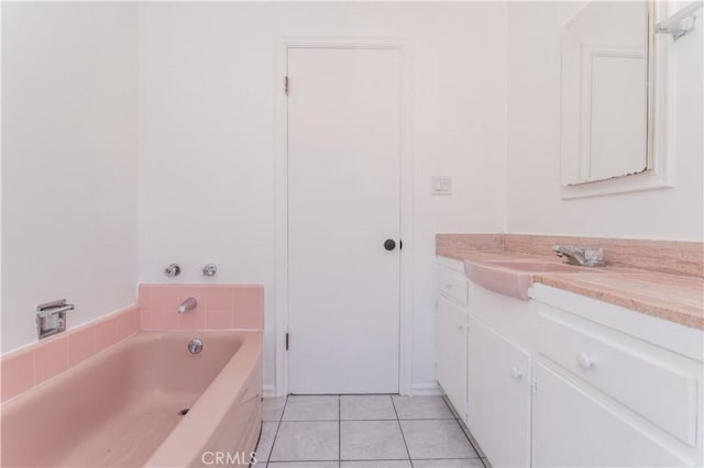 15903 Bryant St, North Hills, CA 91343 - bathroom featuring vanity, tile patterned flooring, and a garden tub