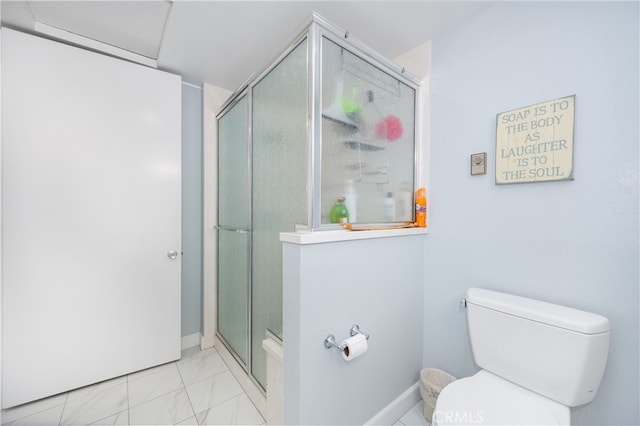 1420 Northwood Rd Unit 241C, Seal Beach, CA 90740 - full bathroom with toilet, a stall shower, marble look tile flooring, and baseboards