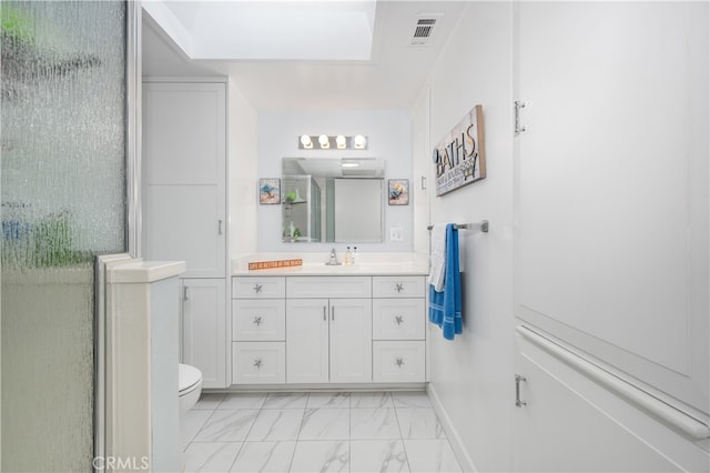 1420 Northwood Rd Unit 241C, Seal Beach, CA 90740 - full bathroom featuring marble look tiles, vanity, toilet, and baseboards