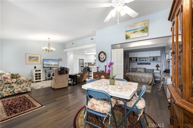 1420 Northwood Rd Unit 241C, Seal Beach, CA 90740 - dining space featuring a chandelier, dark wood finished floors, and a ceiling fan