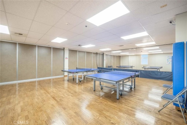 1420 Northwood Rd Unit 241C, Seal Beach, CA 90740 - rec room featuring wood finished floors and a paneled ceiling