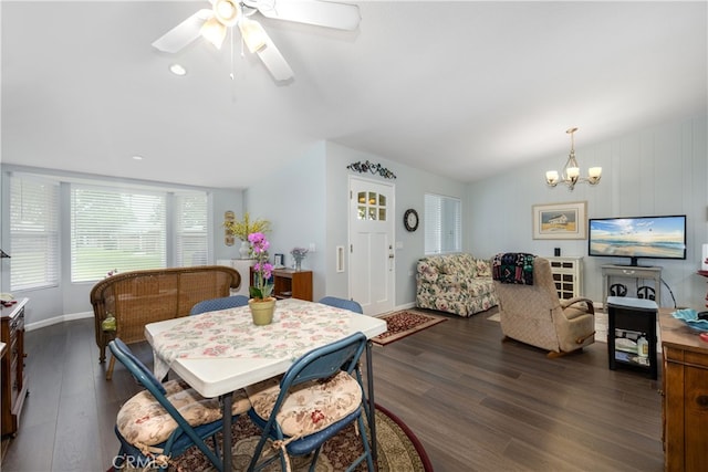 1420 Northwood Rd Unit 241C, Seal Beach, CA 90740 - dining room with dark wood-style flooring, a chandelier, ceiling fan, baseboards, and lofted ceiling