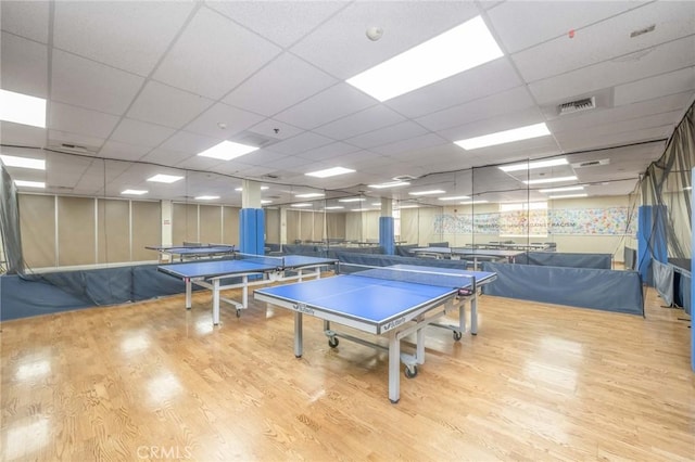 1420 Northwood Rd Unit 241C, Seal Beach, CA 90740 - rec room featuring wood finished floors and a paneled ceiling