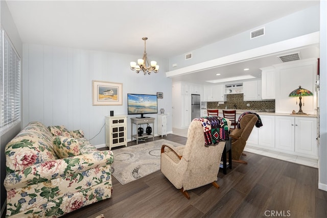 1420 Northwood Rd Unit 241C, Seal Beach, CA 90740 - living area featuring a chandelier, dark wood-style flooring, and recessed lighting