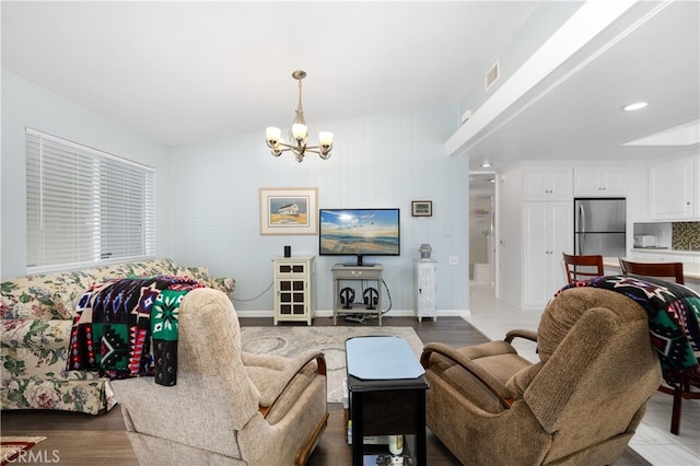 1420 Northwood Rd Unit 241C, Seal Beach, CA 90740 - living room with a chandelier and wood finished floors