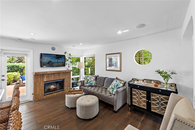 24532 Kings, Laguna Niguel, CA 92677 - living room with plenty of natural light, dark wood-type flooring, a premium fireplace, and recessed lighting