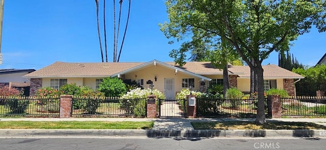 23511 Berdon St, Woodland Hills, CA 91367 - ranch-style home featuring a fenced front yard, stucco siding, and a gate