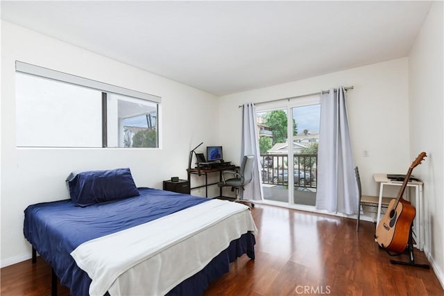 3516 E Ransom St Unit 103, Long Beach, CA 90804 - bedroom featuring access to outside, wood finished floors, and baseboards