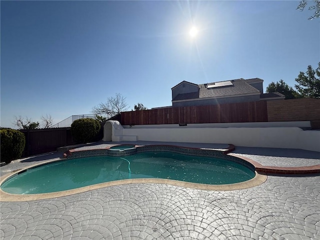 38422 Puma Ln, Palmdale, CA 93551 - view of pool featuring a patio area, a fenced backyard, and a pool with connected hot tub