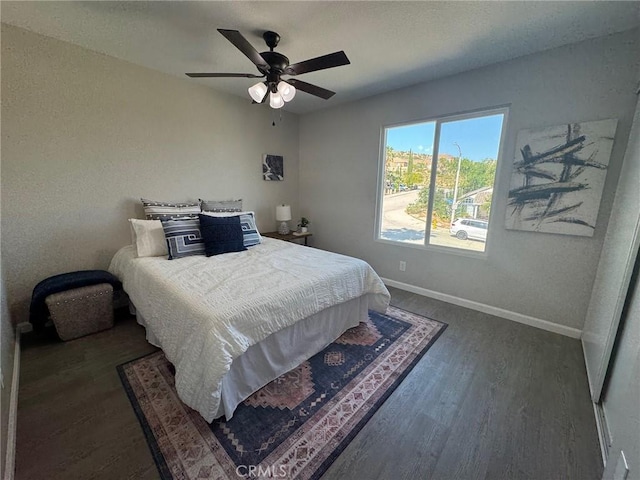 38422 Puma Ln, Palmdale, CA 93551 - bedroom with baseboards, dark wood finished floors, and ceiling fan