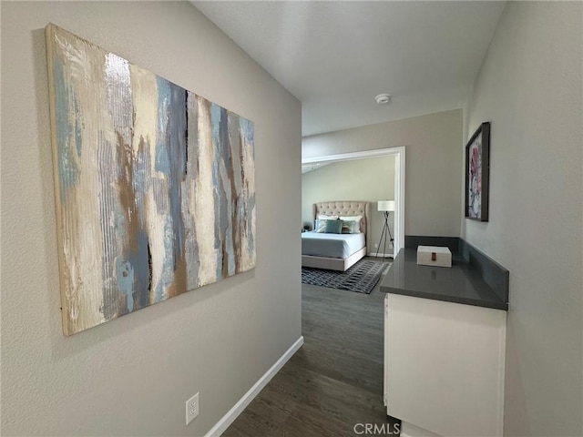 38422 Puma Ln, Palmdale, CA 93551 - hallway featuring dark wood-type flooring and baseboards