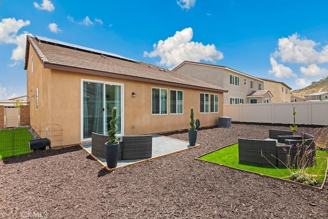 29589 Woodcreek Trl, Winchester, CA 92596 - back of house with stucco siding, a fenced backyard, a patio area, and a tiled roof