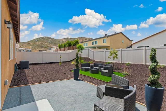 29589 Woodcreek Trl, Winchester, CA 92596 - fenced backyard with a mountain view, a patio area, and cooling unit