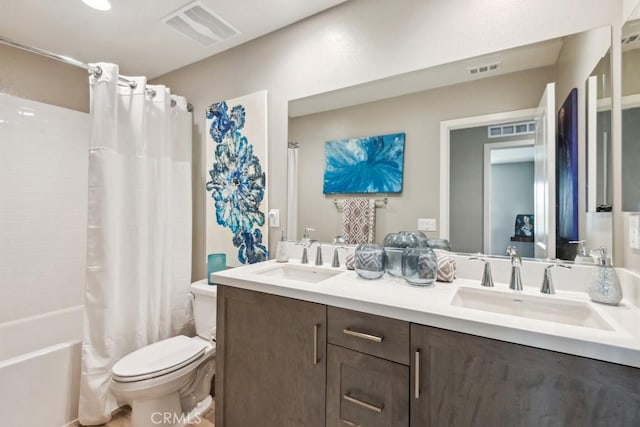 29589 Woodcreek Trl, Winchester, CA 92596 - full bathroom with toilet, double vanity, and shower / tub combo