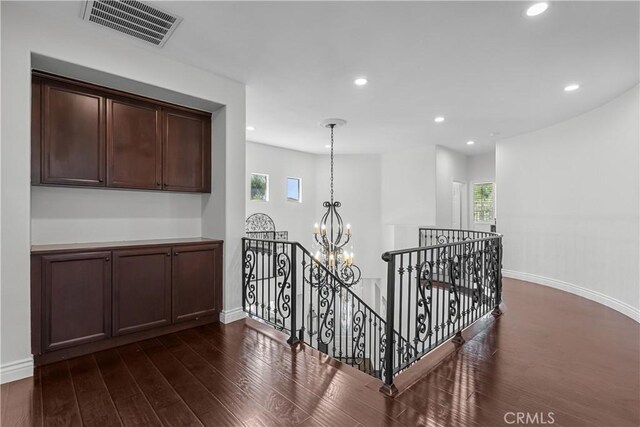 29259 Black Pine Way, Saugus, CA 91390 - hall featuring an upstairs landing, a chandelier, dark wood finished floors, recessed lighting, and baseboards