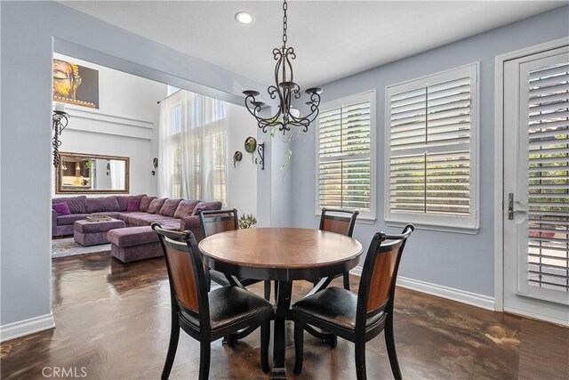 29259 Black Pine Way, Saugus, CA 91390 - dining space featuring concrete floors, baseboards, a chandelier, healthy amount of natural light, and recessed lighting