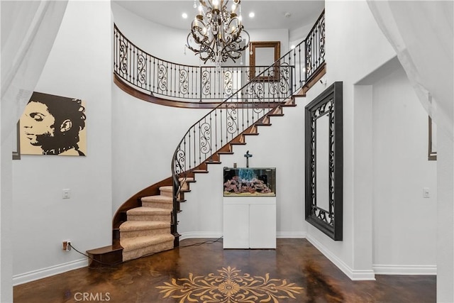29259 Black Pine Way, Saugus, CA 91390 - stairs with finished concrete flooring, baseboards, a chandelier, a high ceiling, and recessed lighting