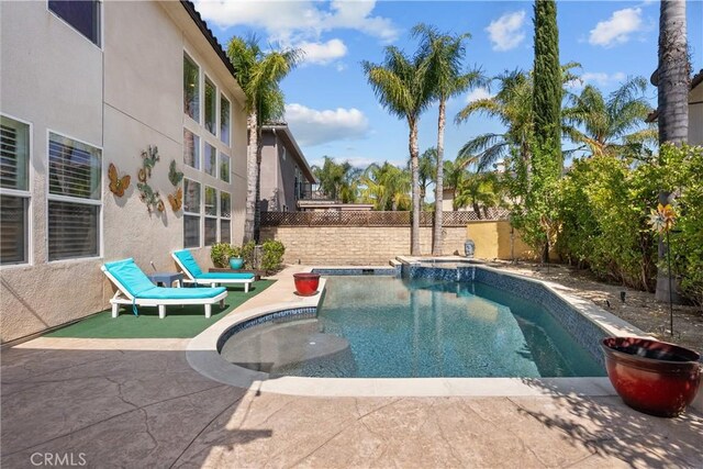29259 Black Pine Way, Saugus, CA 91390 - view of pool with a fenced backyard, a patio area, and a pool with connected hot tub