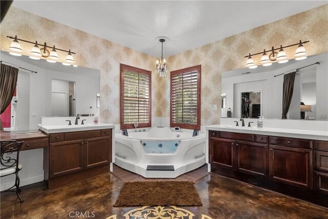 29259 Black Pine Way, Saugus, CA 91390 - bathroom with wallpapered walls, two vanities, a whirlpool tub, finished concrete floors, and a chandelier